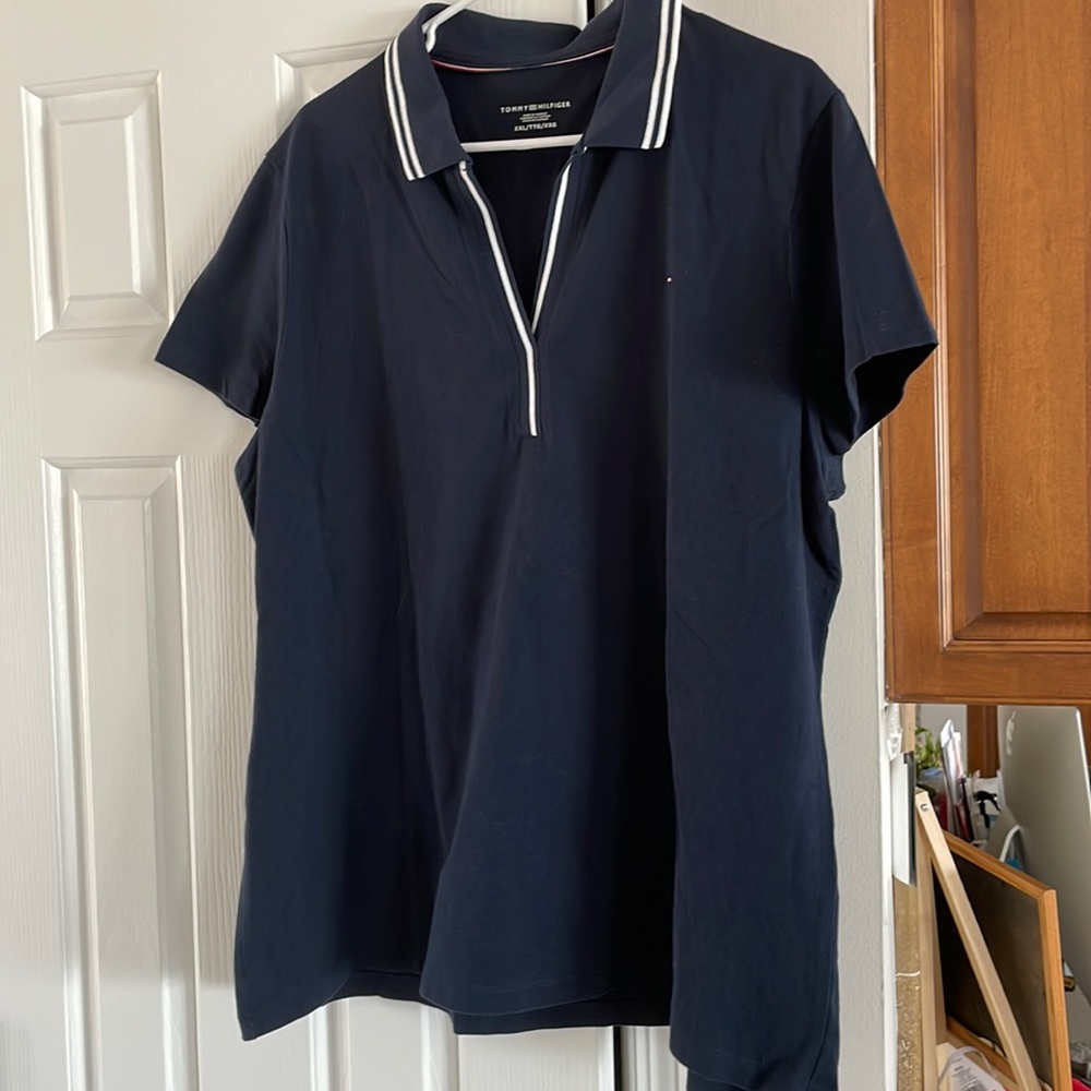 Tommy Hilfiger collared T-shirt. Crisp navy blue.